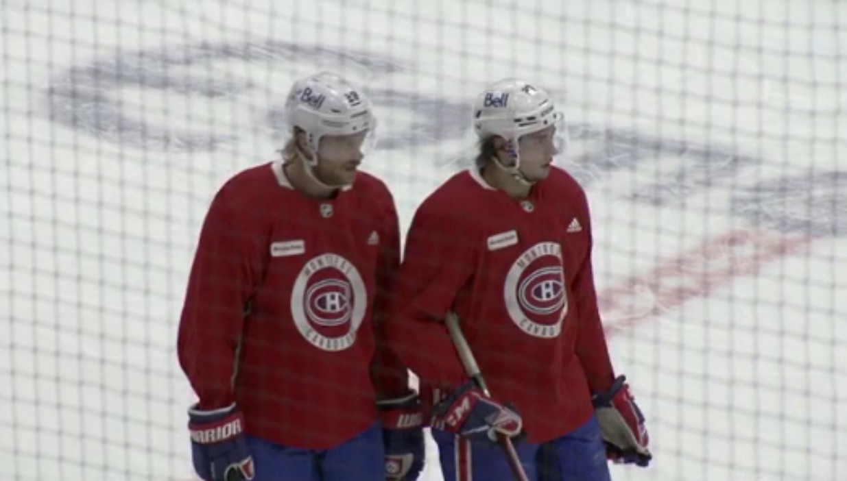 Jon Merrill s'entraîne avec Alexander Romanov